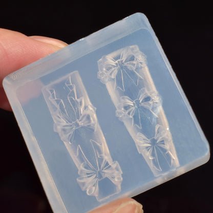Close up of butterfly nail art mold cavities