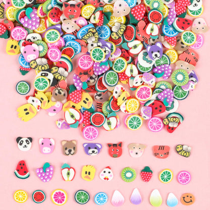 Assorted DECORA soft clay nail decorations mixed into clear handmade slime showing vibrant color payoff and texture variety