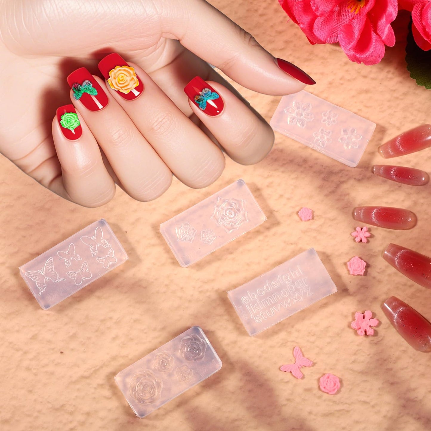 DIY 3D floral nail charms created using silicone molds