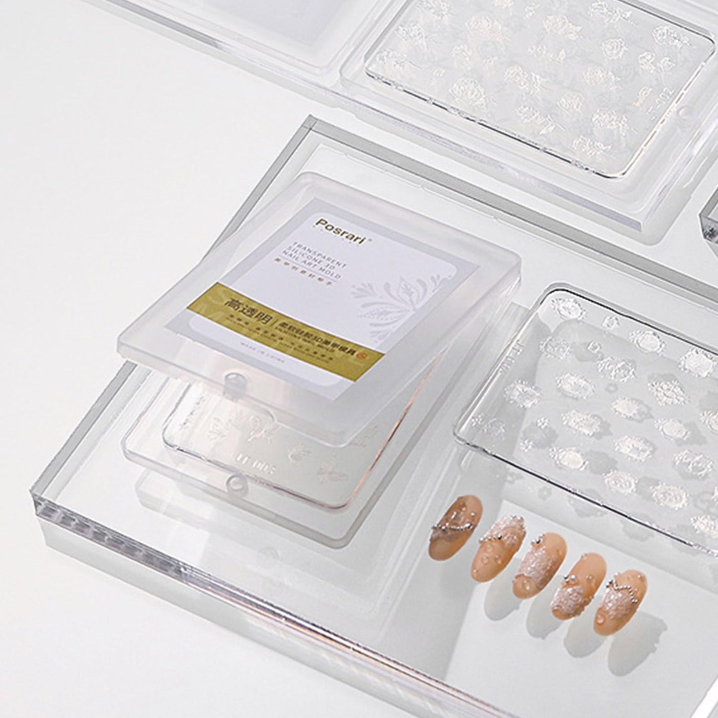 Professional nail technician using butterfly mold for manicure