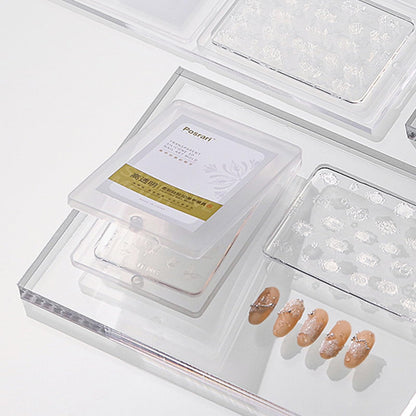 Professional nail technician using butterfly mold for manicure