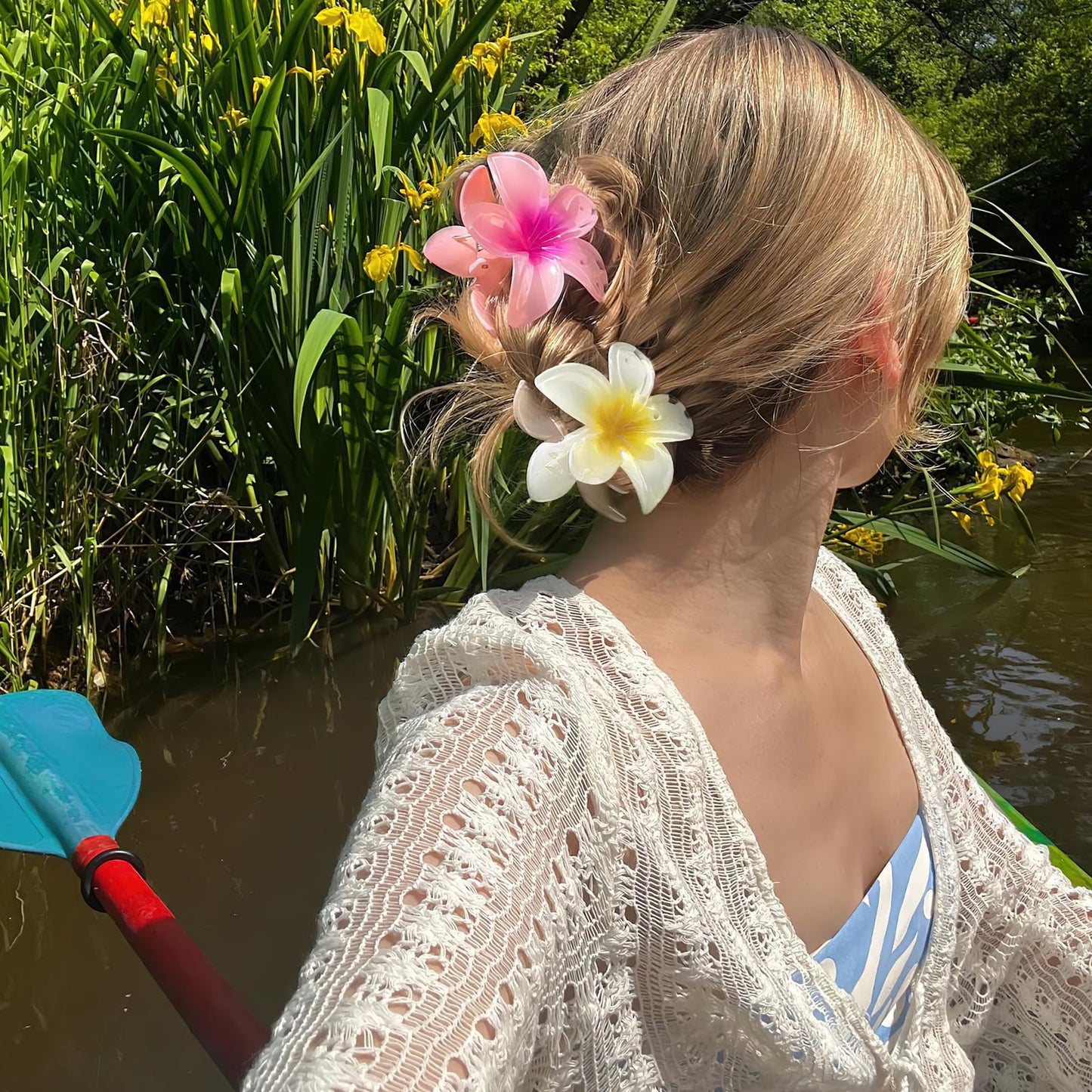 Close up of colorful floral hair claw clips for thick hair