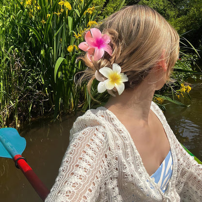 Close up of colorful floral hair claw clips for thick hair