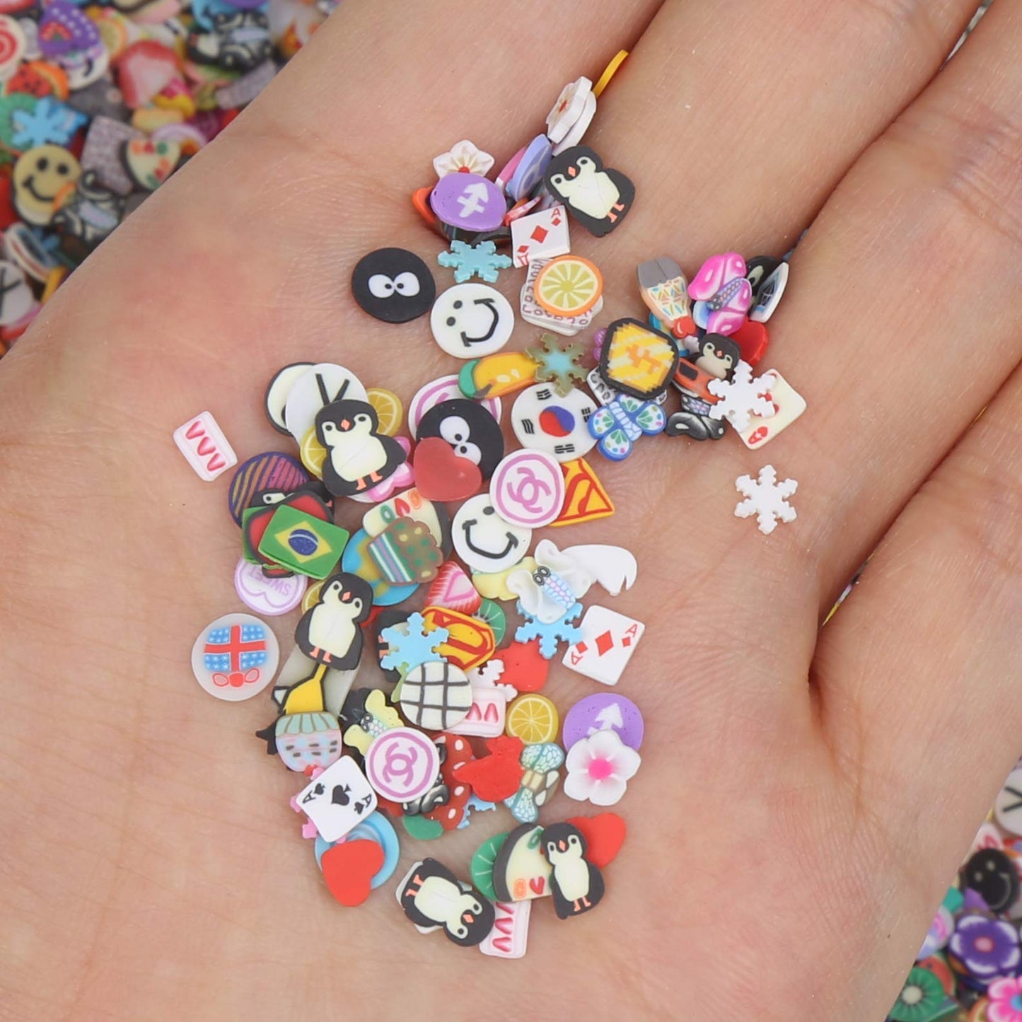 DIYASY polymer clay slices mixed into clear slime as colorful texture fillers.