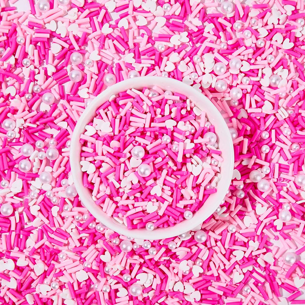 Hot pink and colorful craft sprinkles on white background