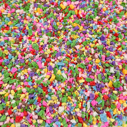 Close up of 13-mixed colorful irregular polymer clay slices