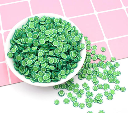 Close up of colorful polymer clay lime fruit slices