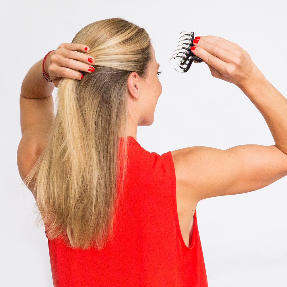 Set of two Revlon claw clips on white background