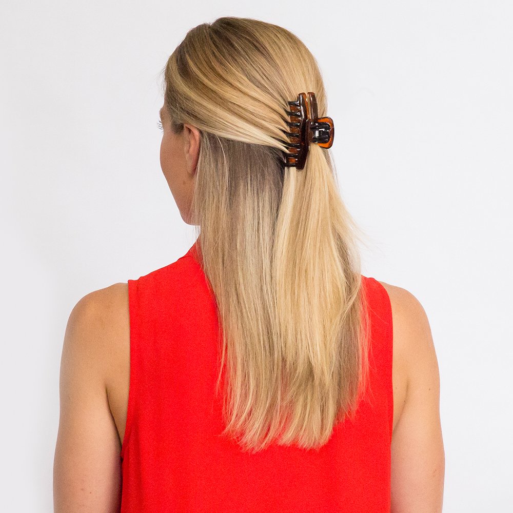 Revlon hair claw clips demonstrating secure hold