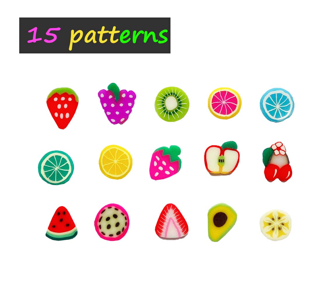 Close up view of colorful three dimensional polymer clay fruit slices showing strawberry watermelon and kiwi shapes