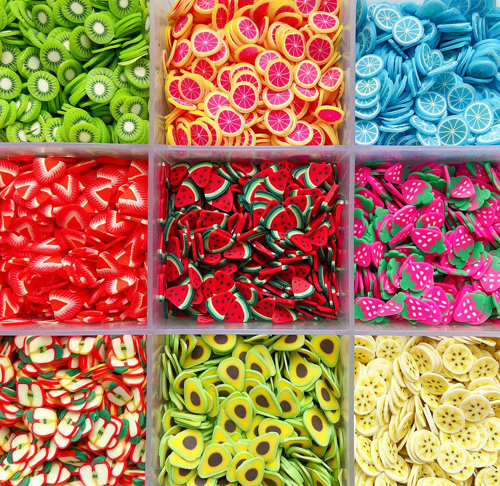 Transparent organizer box filled with colorful polymer clay pieces