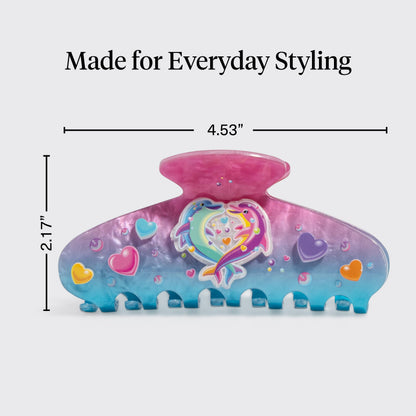 Model styling thick hair with the shimmering pink and blue Lisa Frank hair accessory