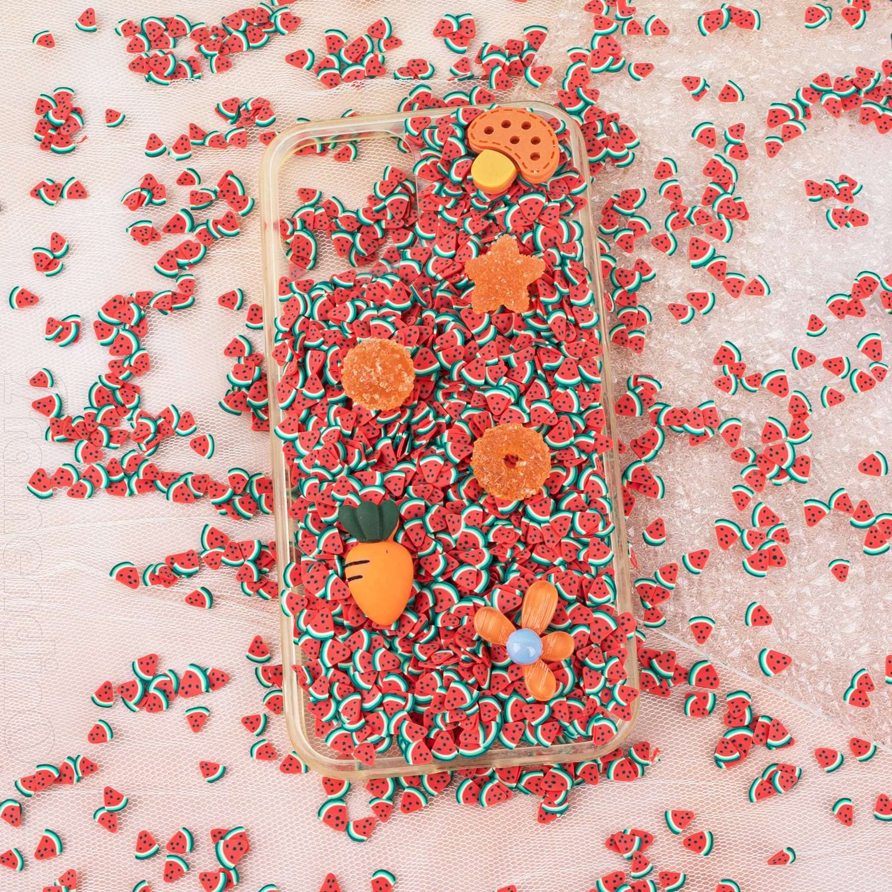 Miniature 3D fruit slices by Framendino applied on manicured nails