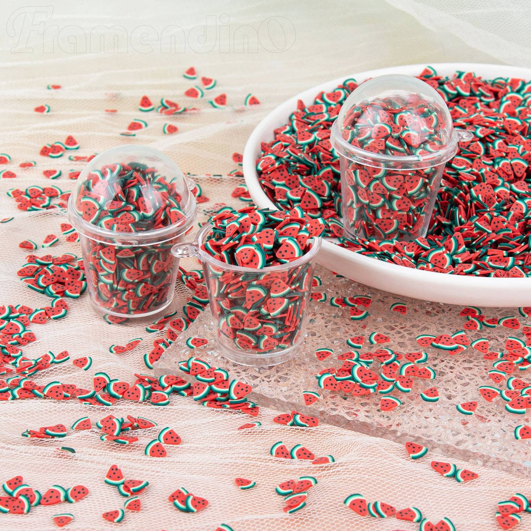 Framendino watermelon fimo slices mixed into clear resin jewelry casting
