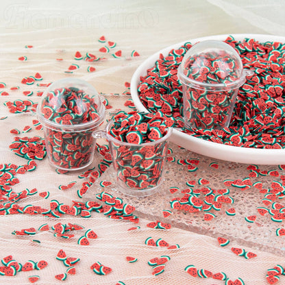 Framendino watermelon fimo slices mixed into clear resin jewelry casting
