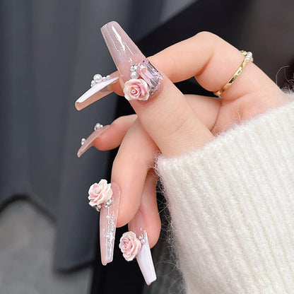 Finished 3D flower nail charms made with Jaliya molds