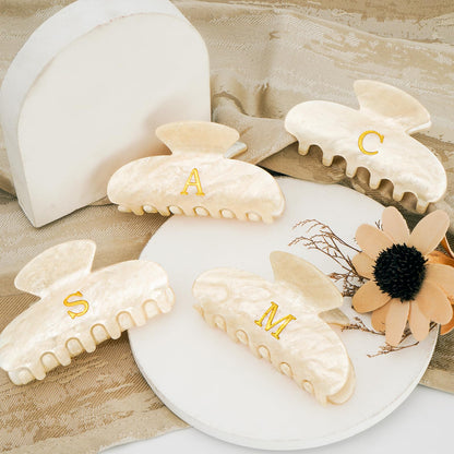 Fycert premium acrylic hair clamp showing the smooth rounded inner teeth construction