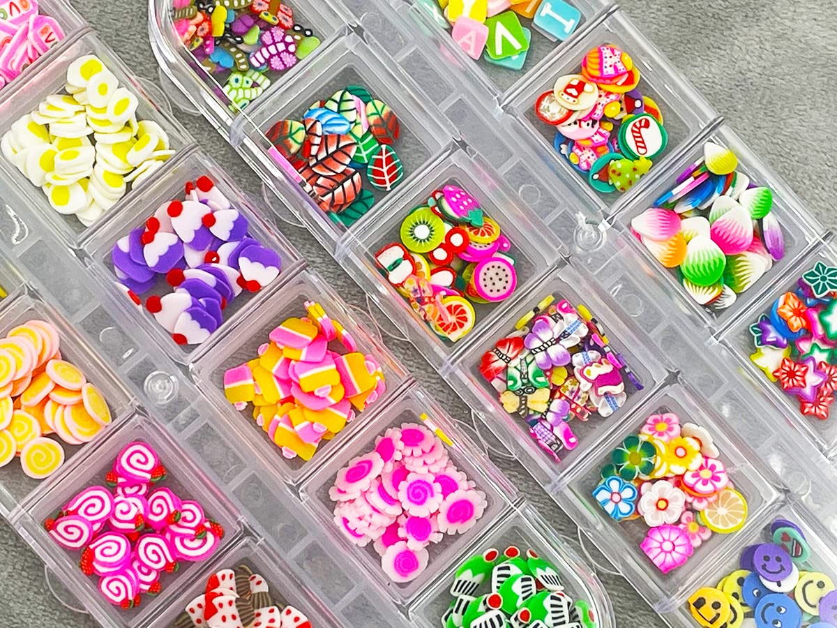 Multi colored premium polymer clay mini slices being applied onto a decorated phone case project