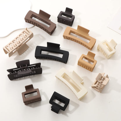 Full collection of 12 rectangle hair claw clips in packaging
