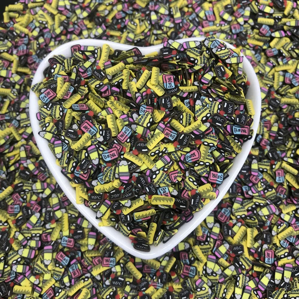 PrettyG Fimo soft clay sprinkles spread out on a flat surface demonstrating the variety of blackboard and ruler shapes.