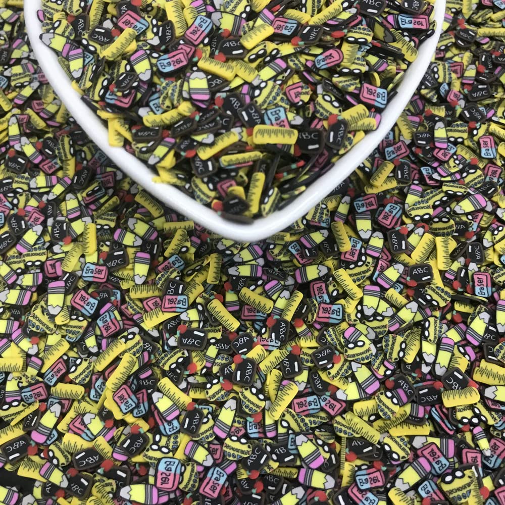Close up view of PrettyG school themed polymer charms embedded inside clear DIY slime for texture comparison.