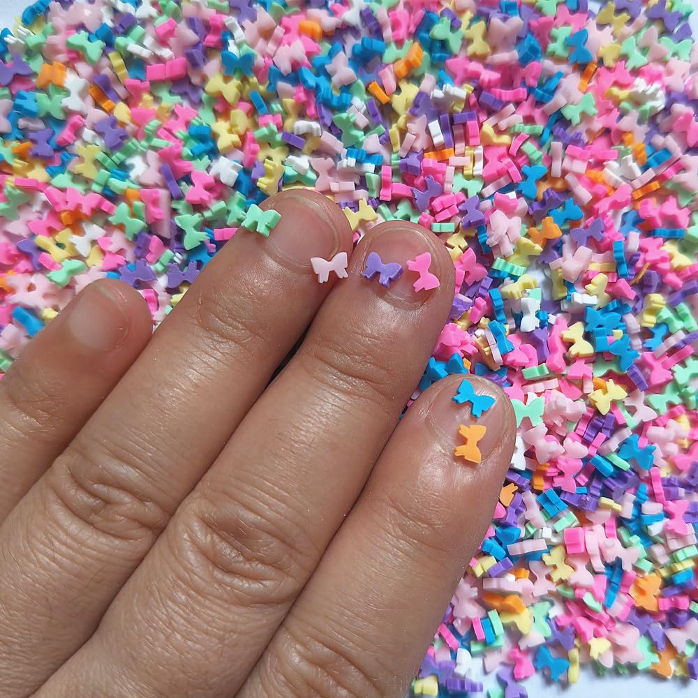 Close up of multicolored bowknot polymer clay slices for nail art
