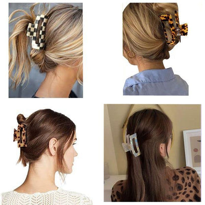 Tortoiseshell pattern hair clips on a white background