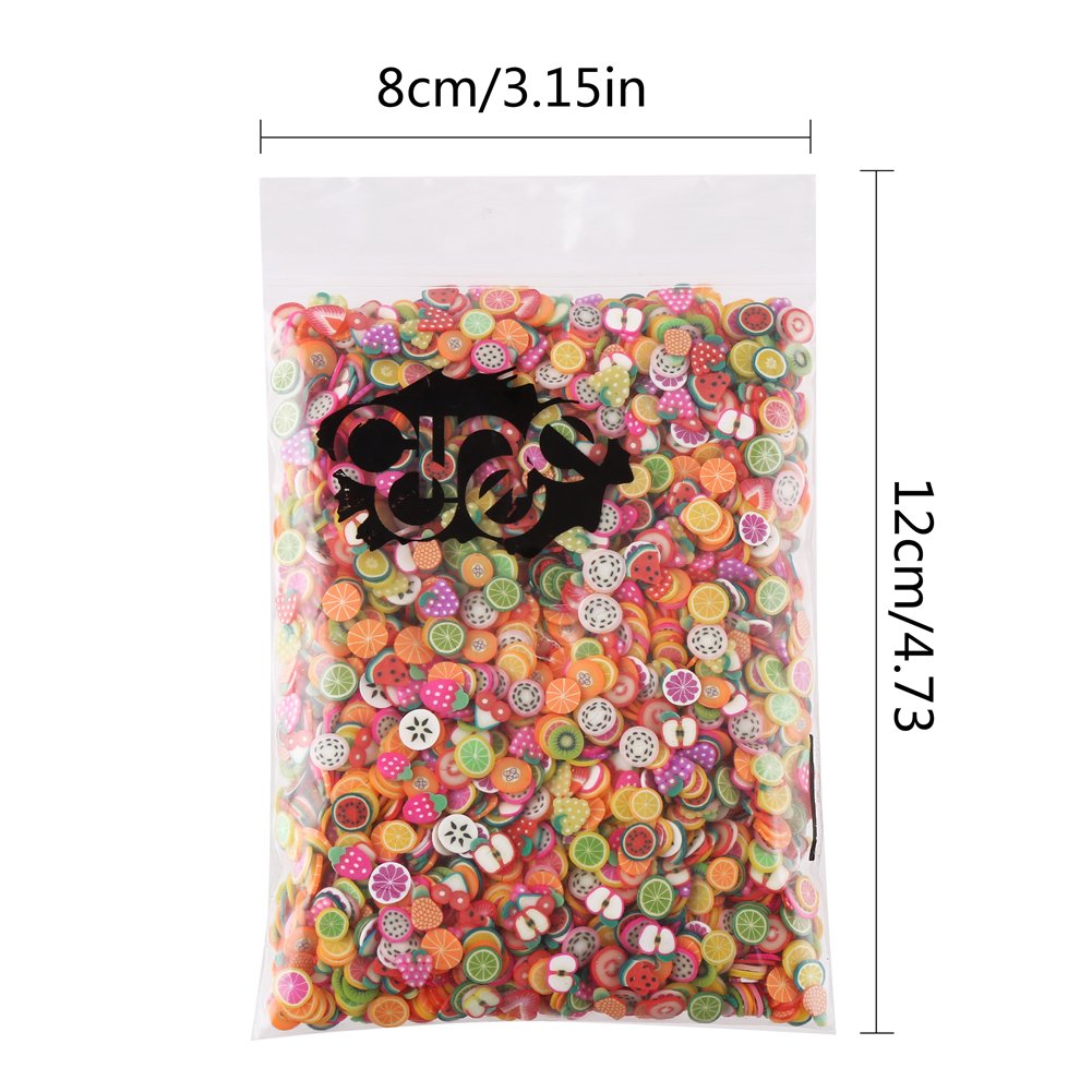 Colorful fruit slice embellishments mixed into clear crunchy slime for sensory play