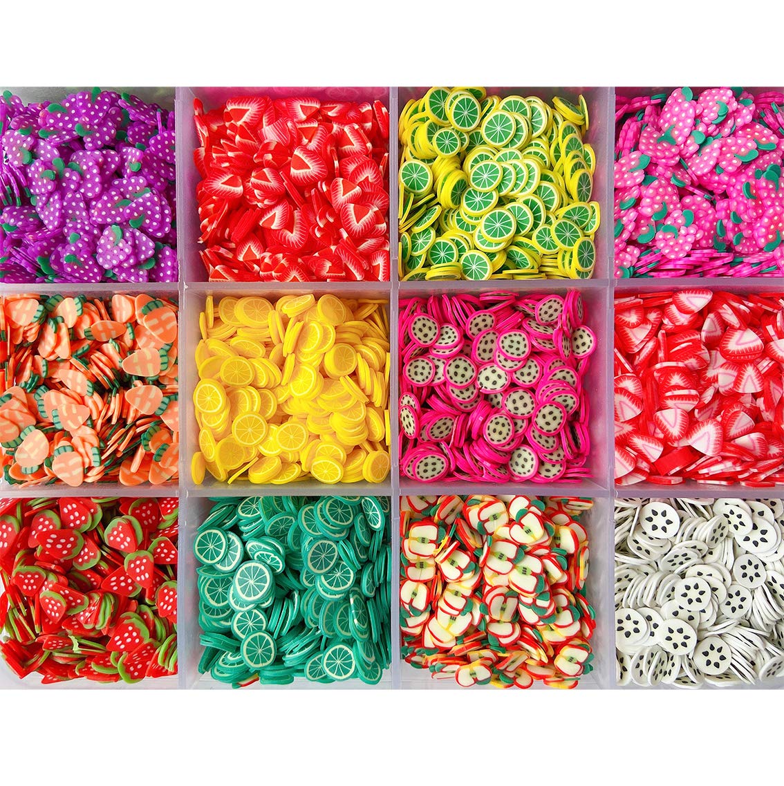 Assorted colorful three dimensional fruit slice shapes used as premium slime fillers and craft supplies