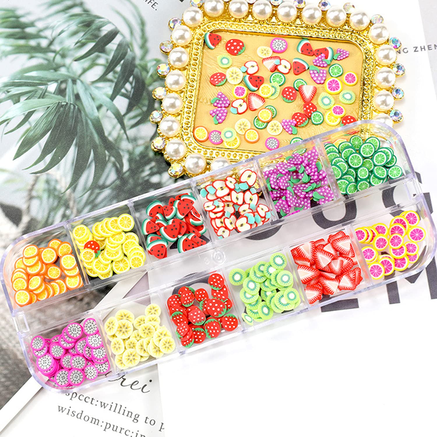 Close up look at miniature polymer clay watermelon pieces used for cute summer nails