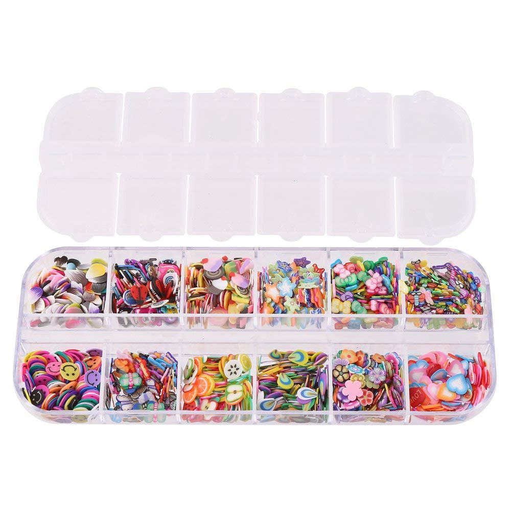 Detailed view of assorted miniature fruit and flower craft decorations made from durable polymer clay
