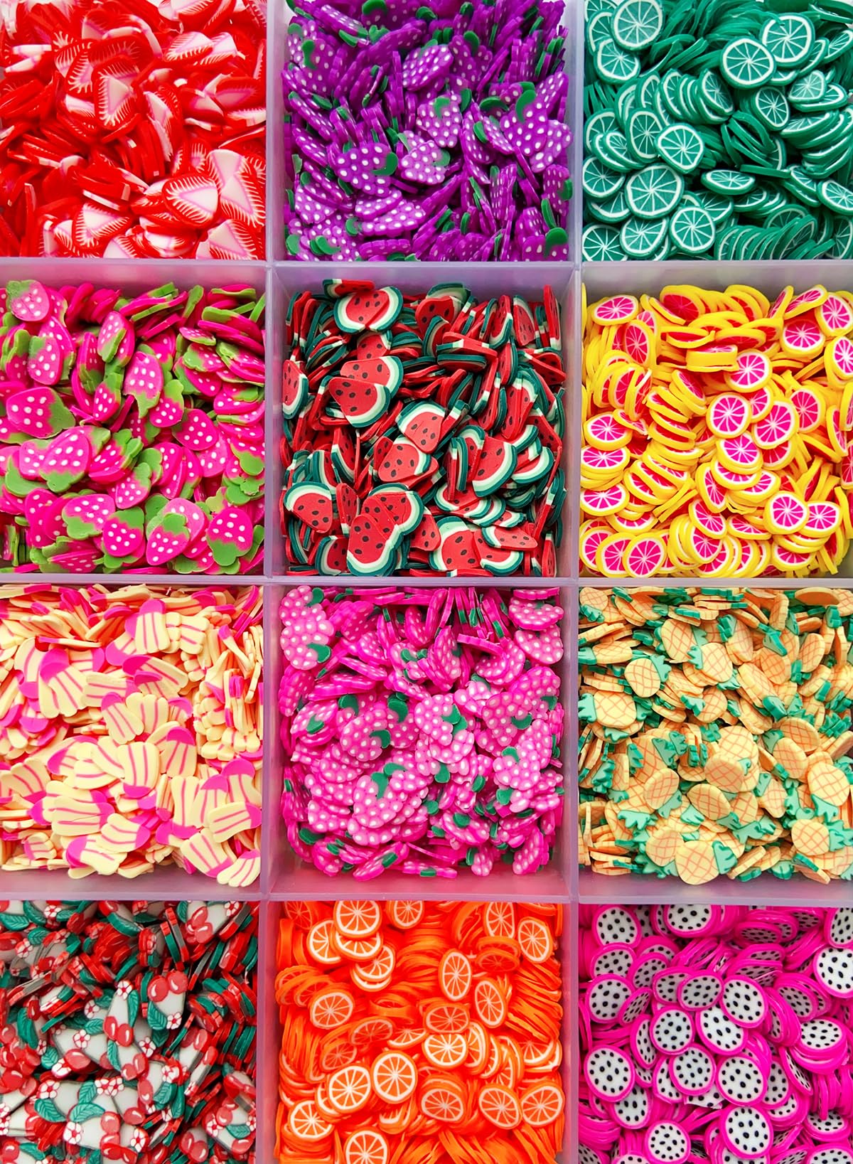 Detailed view of assorted 3D polymer fruit clay slices for crafts