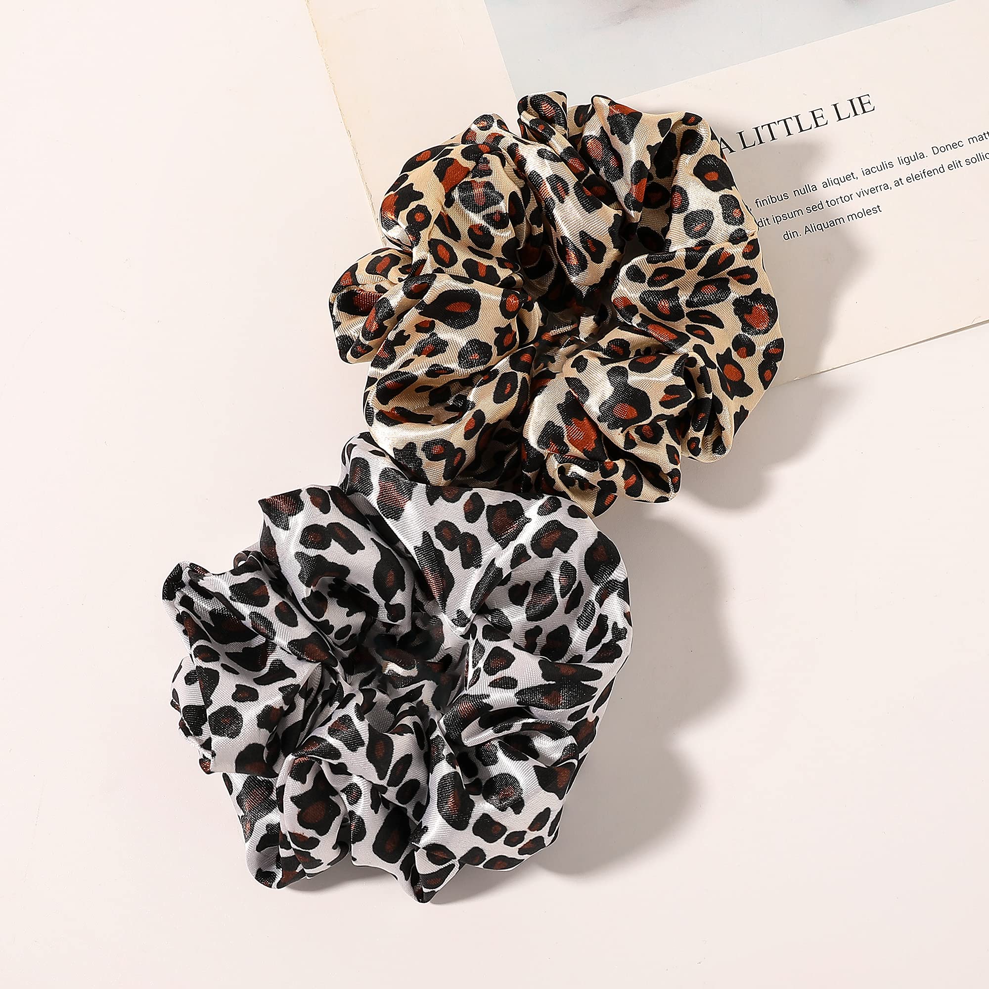 Different angles of the smooth texture on the Ivyu silk satin ponytail holder.