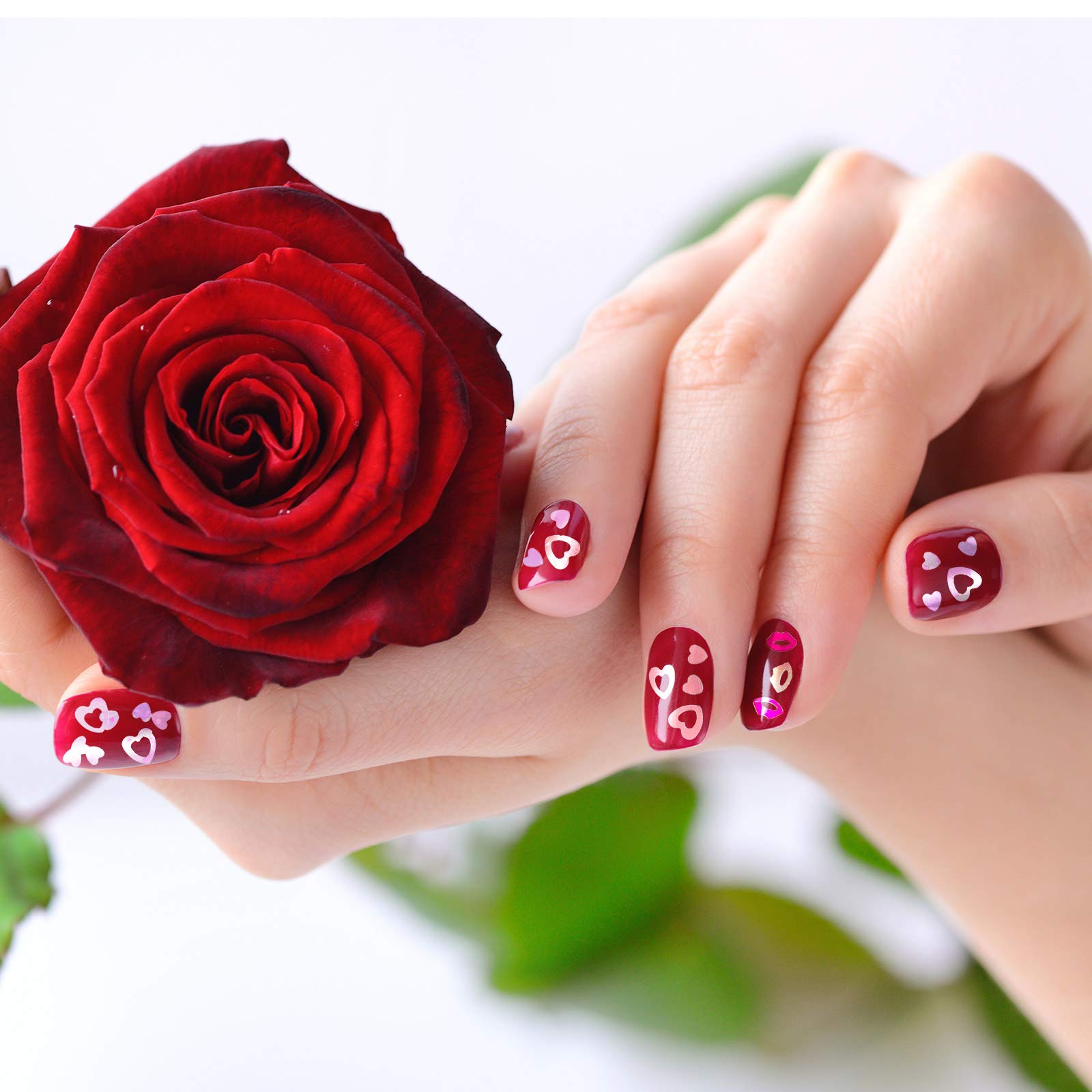 Manicure sample using holographic heart nail art sequins