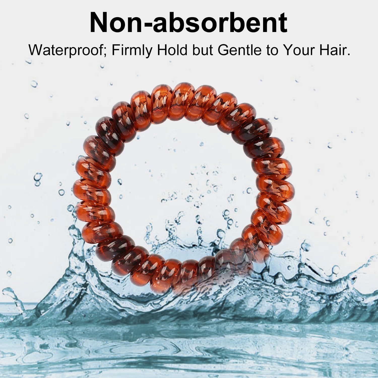 Traceless telephone cord hair coils displayed on a wrist as bracelets.