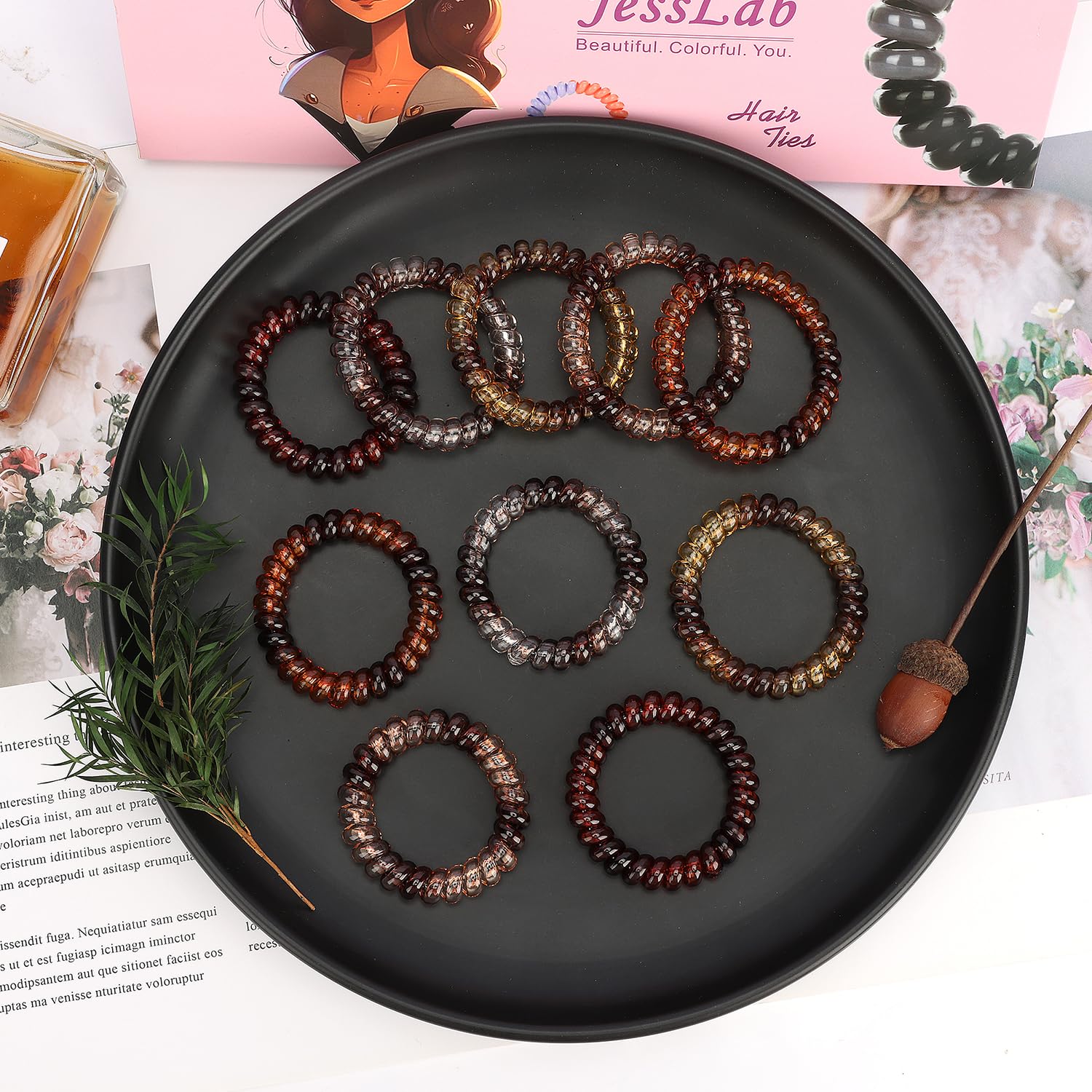 No crease ponytail holders holding a thick brunette ponytail securely in place.