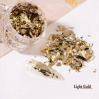 Craft supplies layout with metallic foil flakes for DIY projects