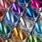 Open jars displaying ultra-fine chrome nail dust colors