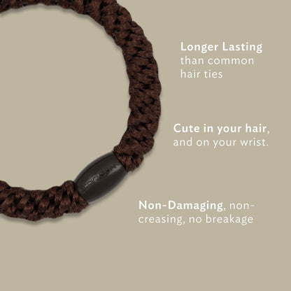 Set of eight L. Erickson exceptionally secure ponytail holders for thick hair.