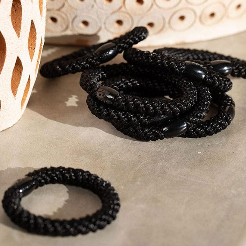L. Erickson luxury hair elastics for secure activewear and damage free styling.