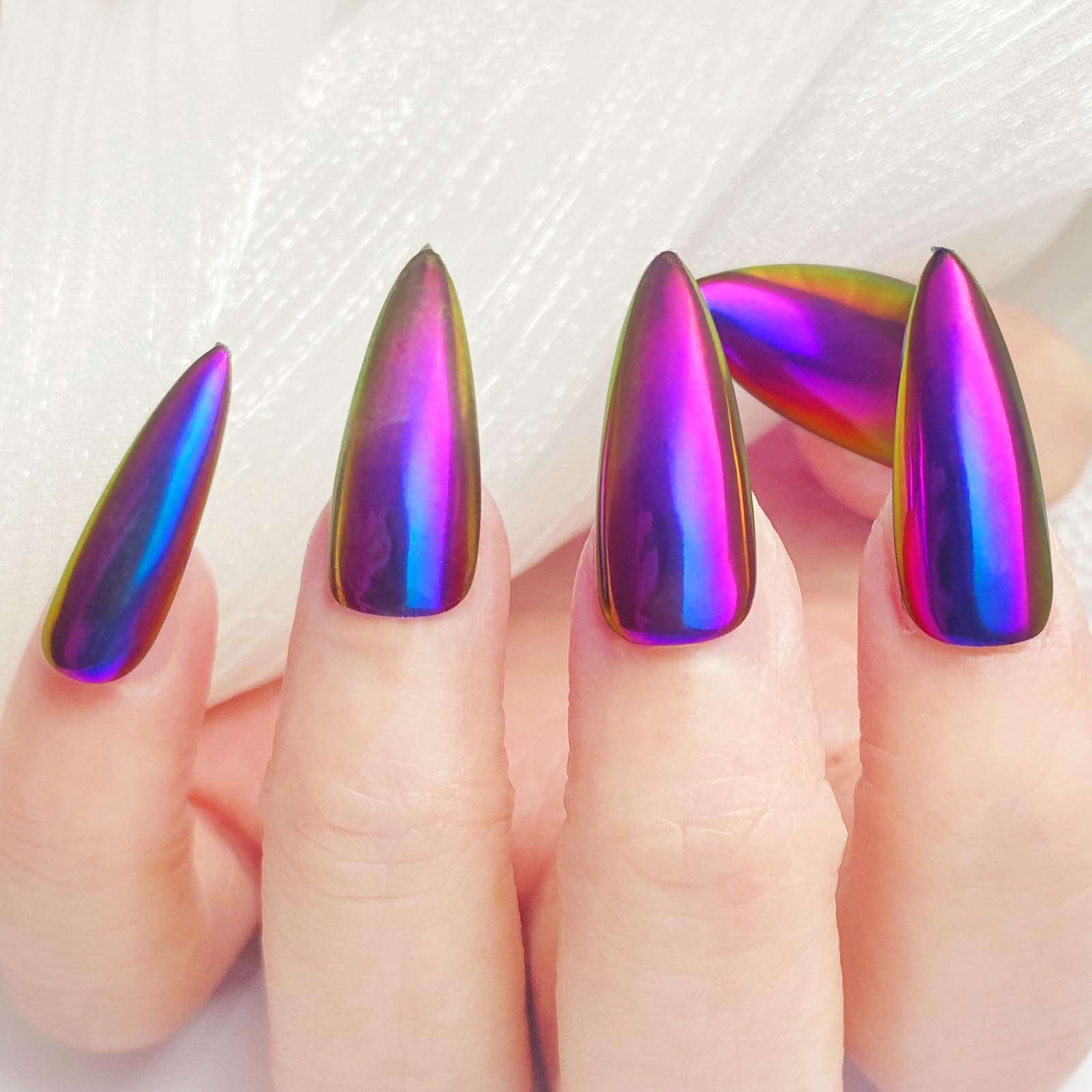 Close up of metallic chameleon nail powder texture