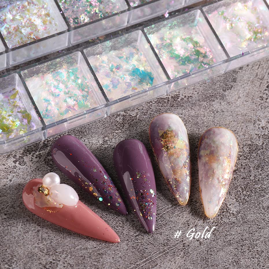 Hand applying holographic nail glitter flakes on acrylic nails