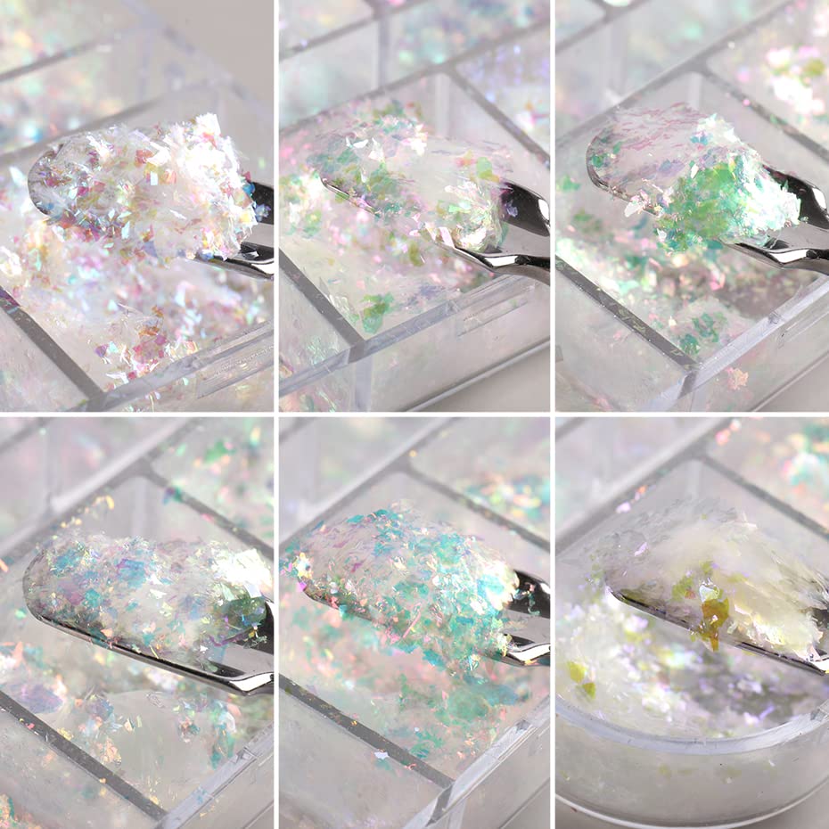 Assorted compartments of shimmering nail art decorations