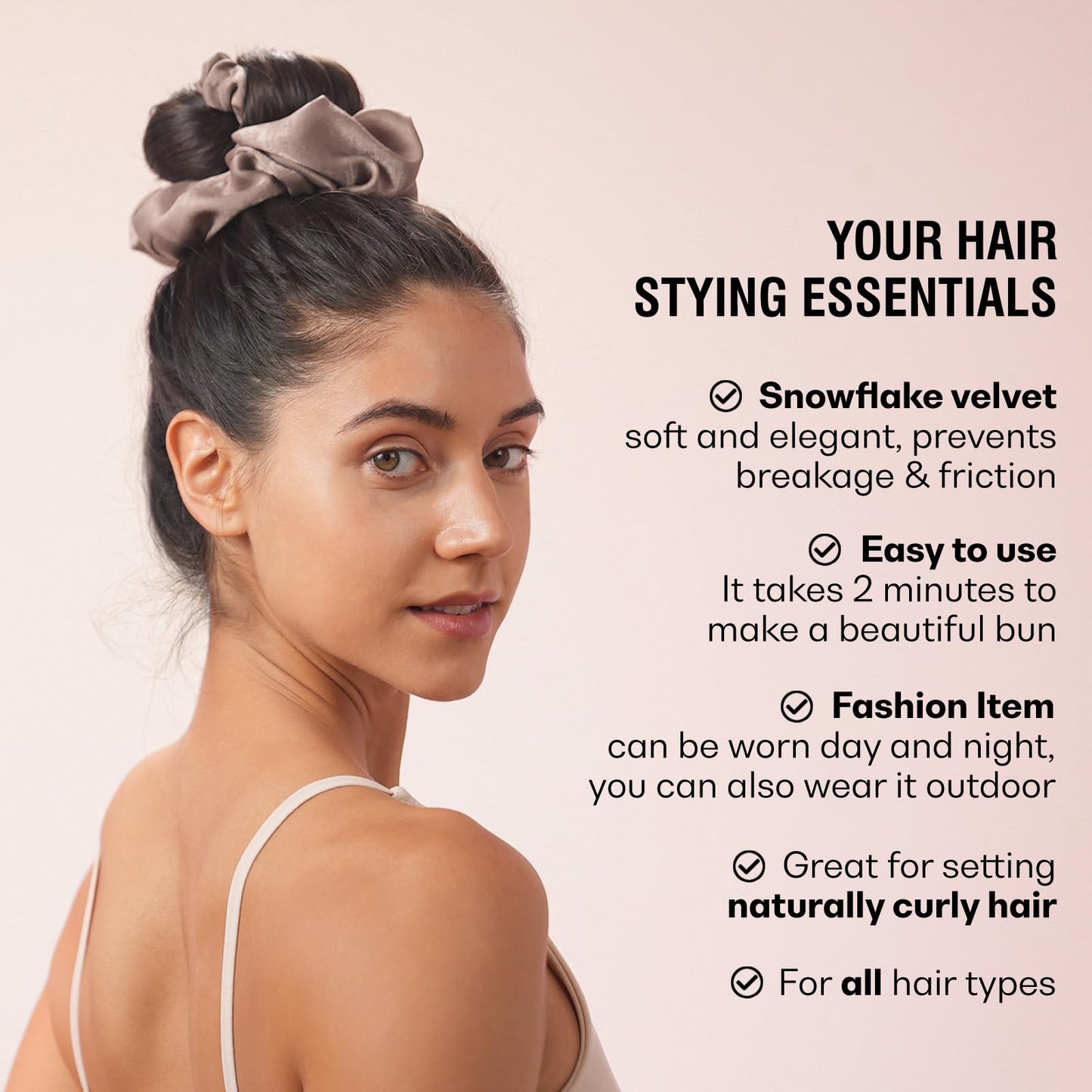 Model showing voluminous heatless curls achieved using the black scrunchie tie