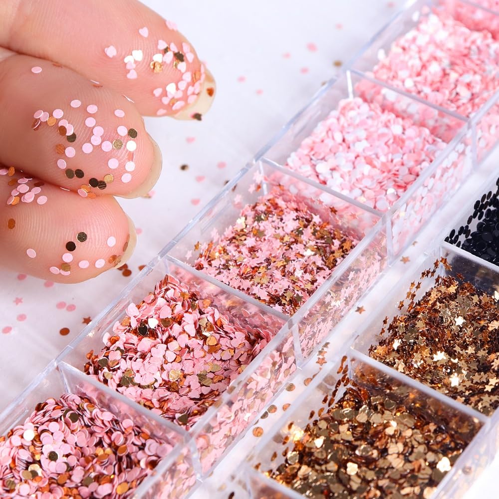 Hand model showing manicure with holographic nail sequins