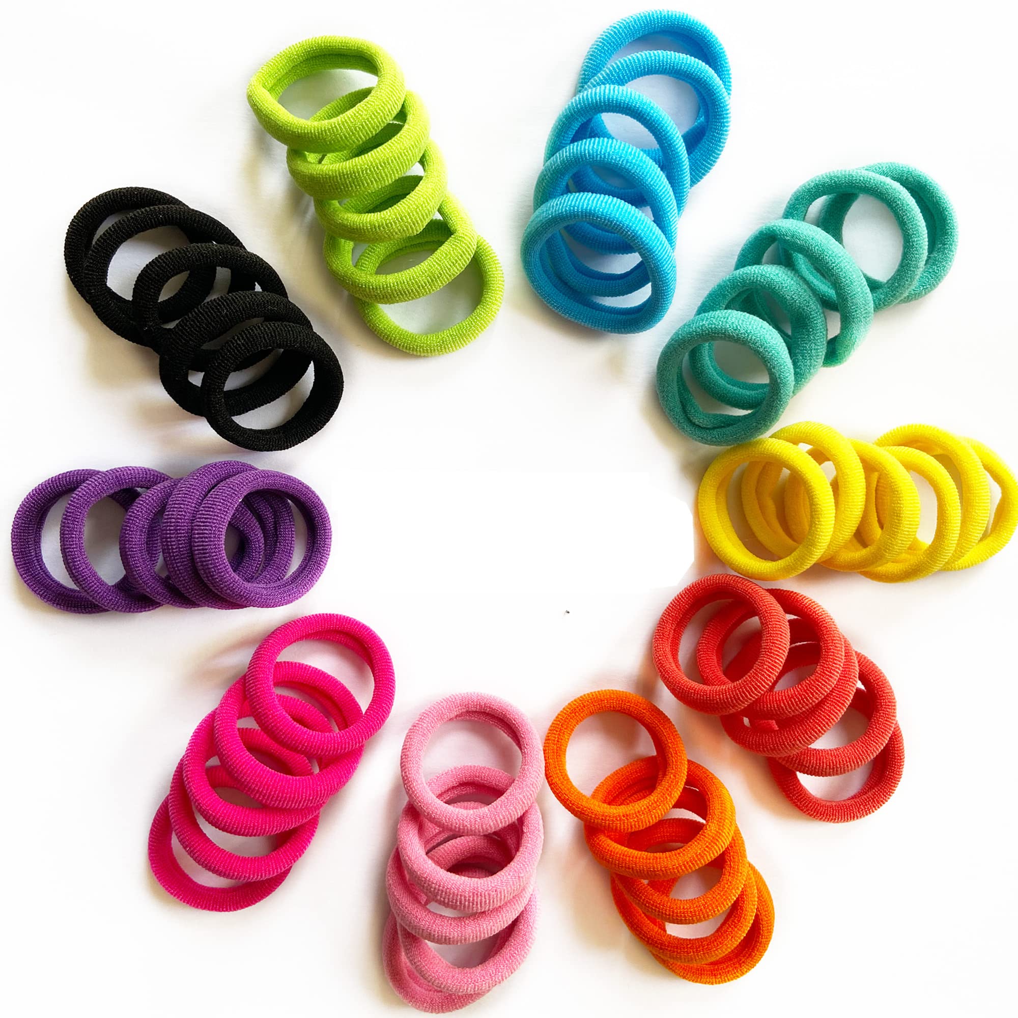Close up view of soft toddler hair ties demonstrating the stretchable seamless cotton material