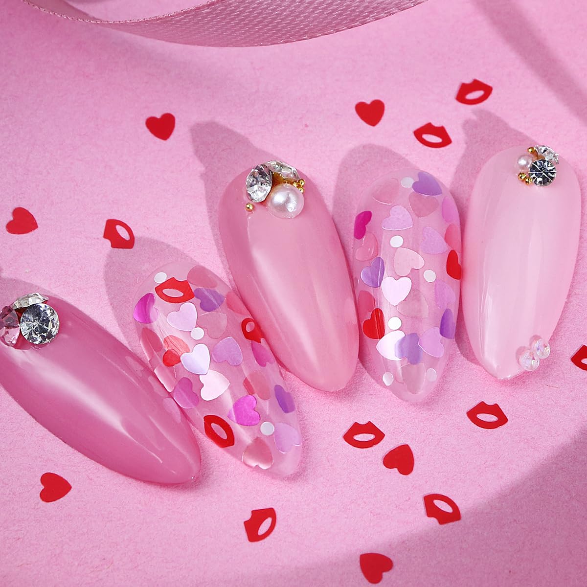 Holographic heart nail flakes displayed for nail art designs