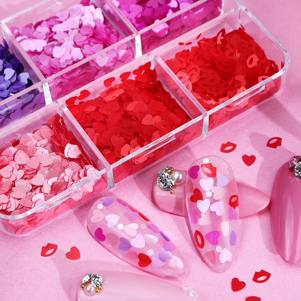 Top view of Valentine's Day themed heart nail art supplies