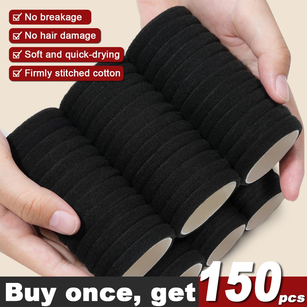 Close up view of elastic black hair bands demonstrating high stretch capabilities.