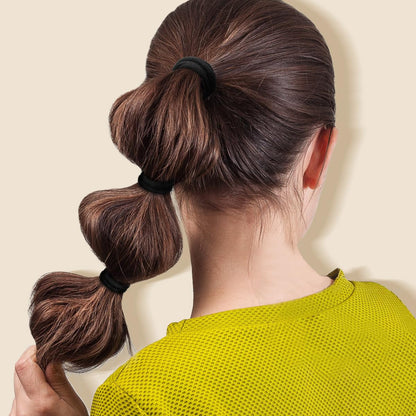 Daily use stretchable black rubber bands alternative for women with curly hair.